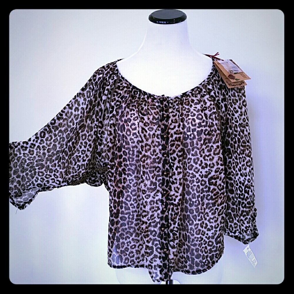 Sugar & Spice leopard and lace bat wing top.